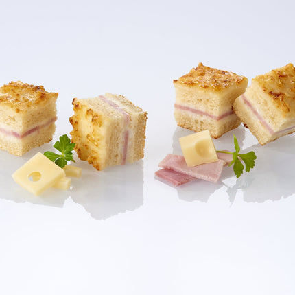 Mini sandwiches with ham and emmental